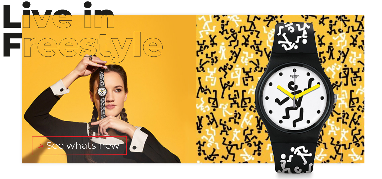 Watch with black and white design on a yellow background with text 'Live in Freestyle'.