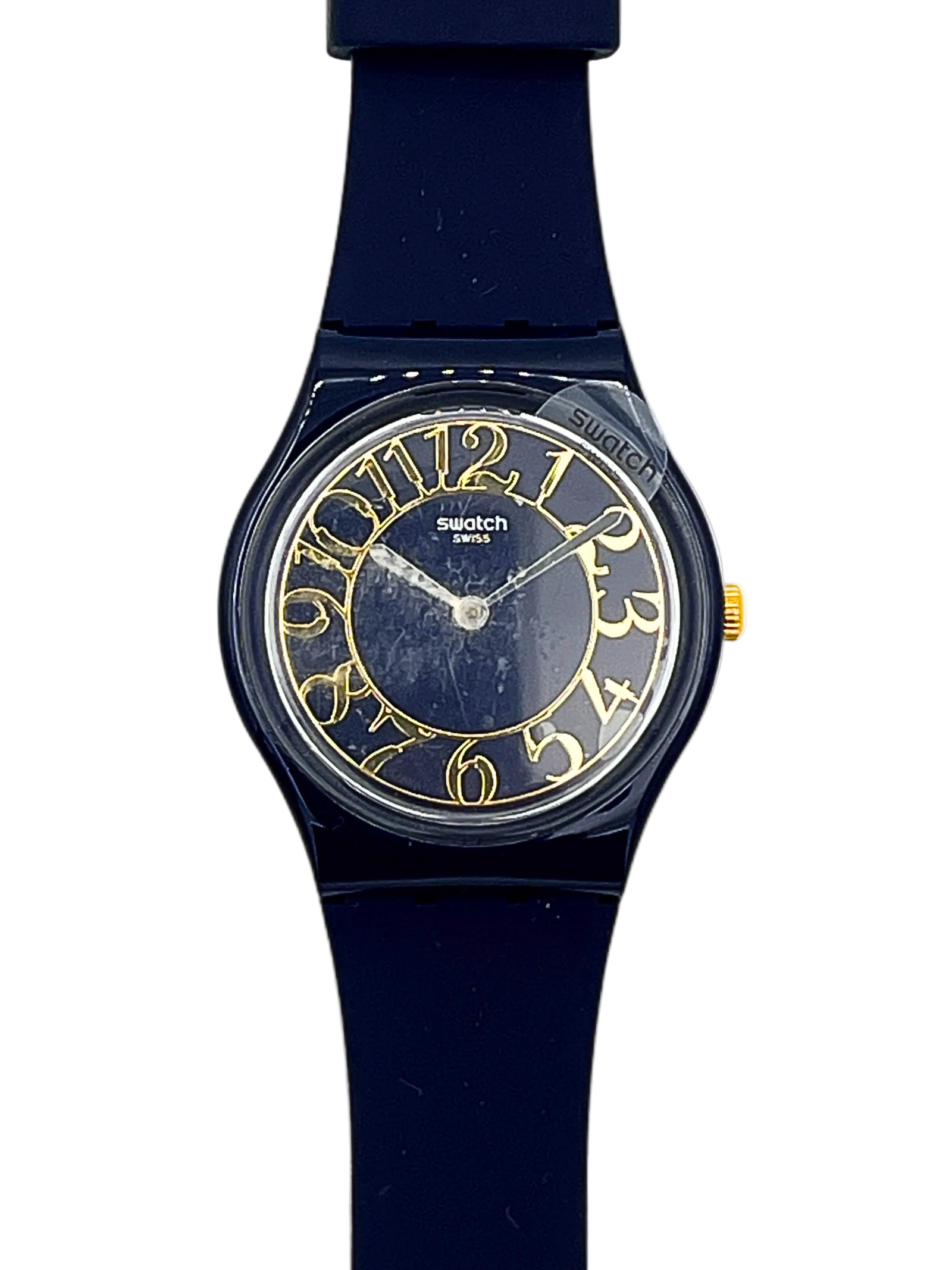 Swatch Swiss Sport watch featuring a dark navy blue silicone strap, a matching dark blue dial, and gold-tone Arabic numerals and hands.