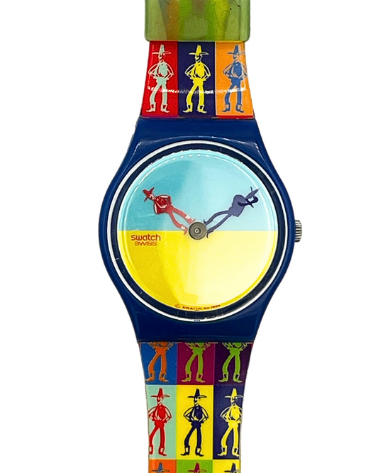 A Swatch watch featuring a colorful cowboy-themed design, with a blue case, a dial showing a yellow and blue landscape, and a strap patterned with cowboy silhouettes in multiple colors.