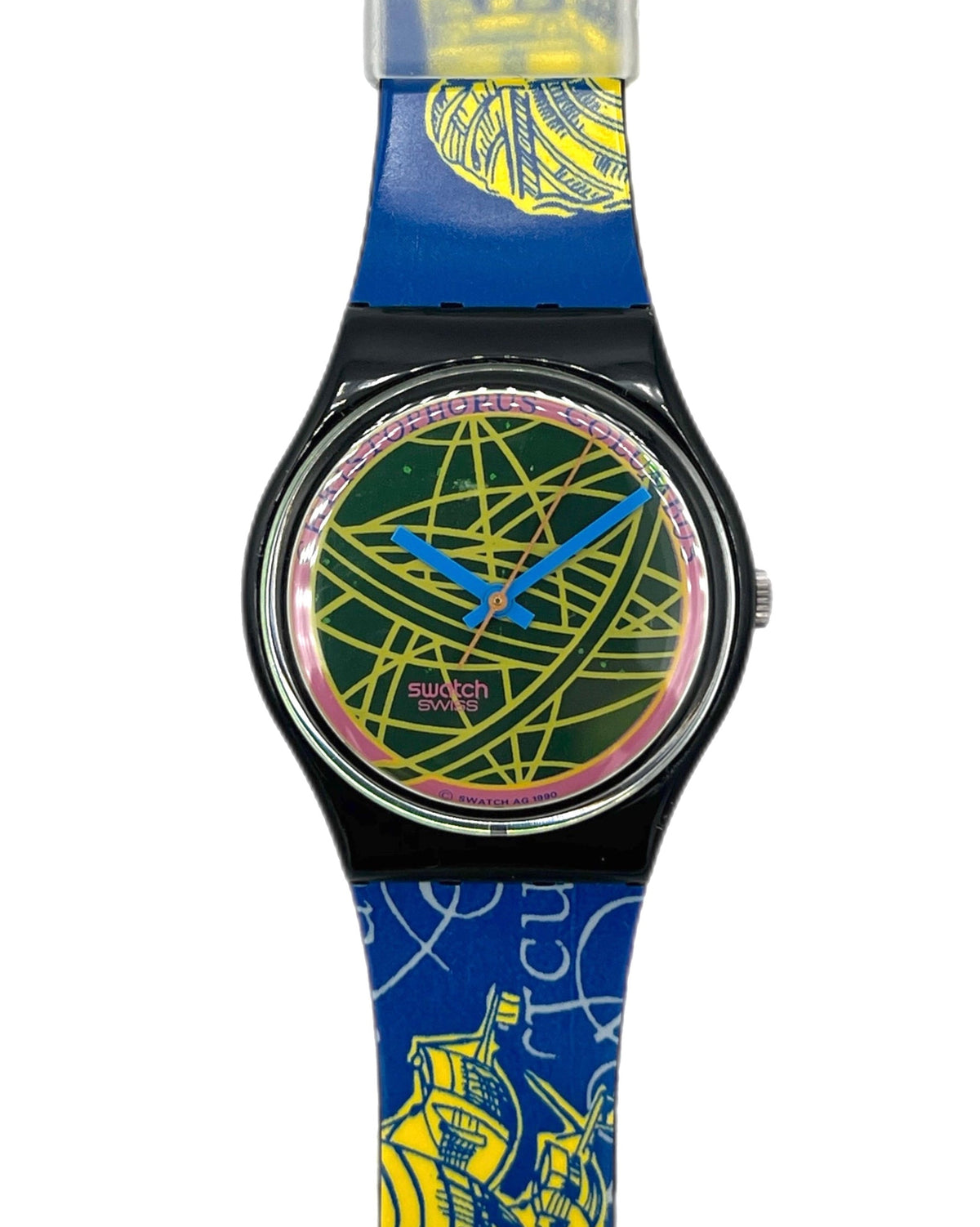 A wristwatch with a black round case and a blue strap featuring yellow pirate ship illustrations and nautical line drawings. The dial has a green map background with blue and pink details.