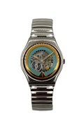 A wristwatch with a silver-tone metal link bracelet and a round case. The dial is open-heart style, showing a turquoise blue background with gold-tone hands and a visible mechanical gear movement inside.