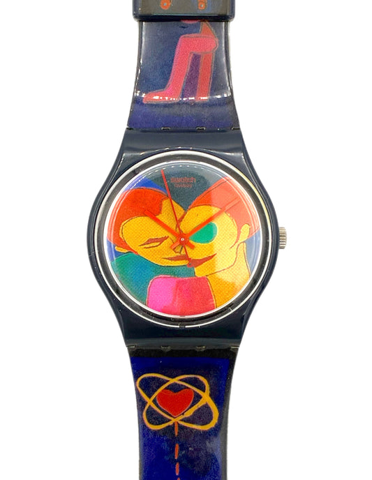 Colorful watch with artistic design on a white background