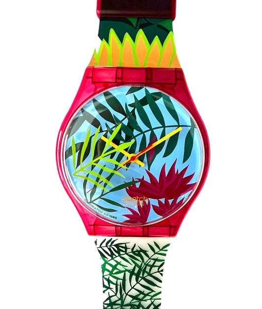 Colorful watch with tropical leaf design on a white background