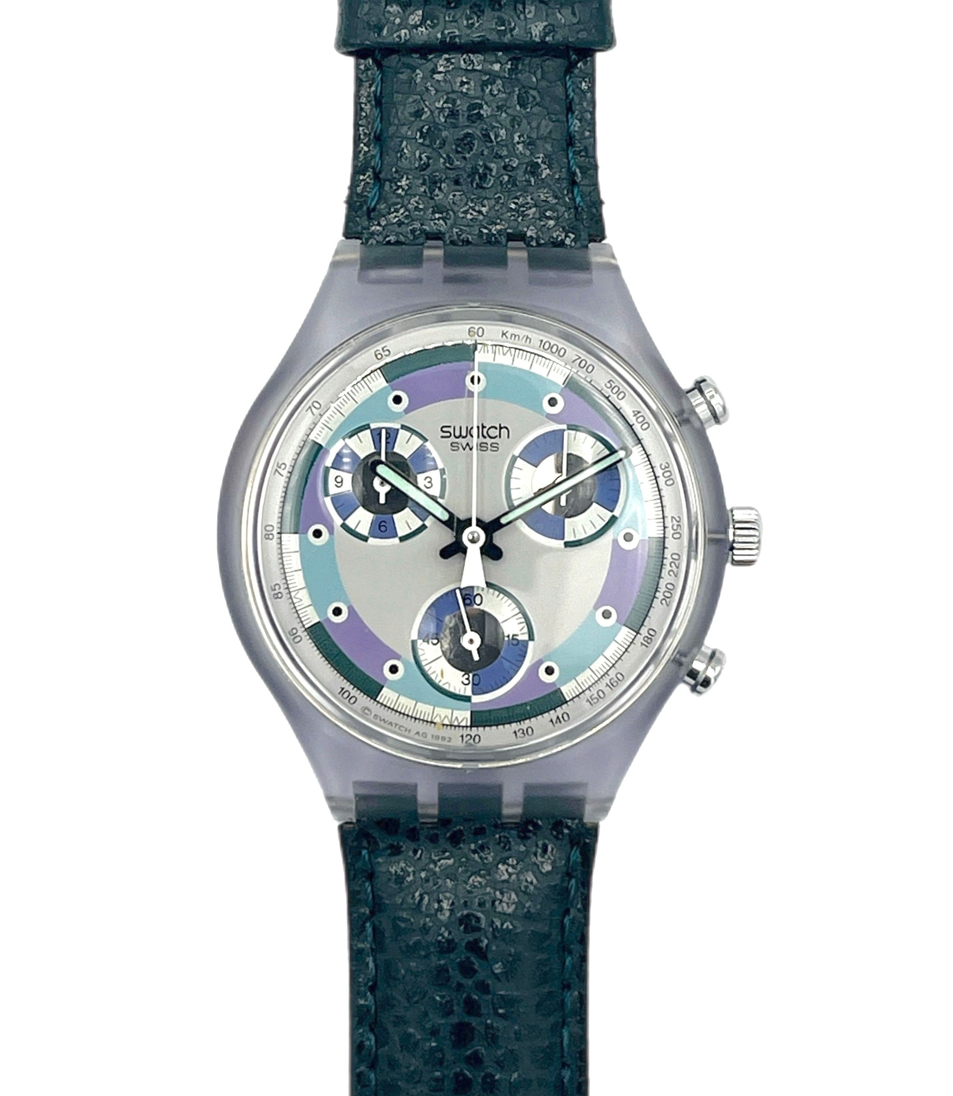 Swatch watch with a green strap and multicolor face on a white background