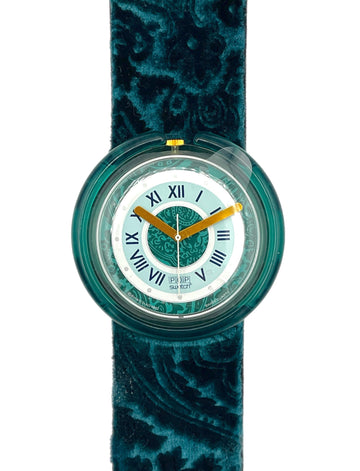 Watch with a green patterned strap on a white background