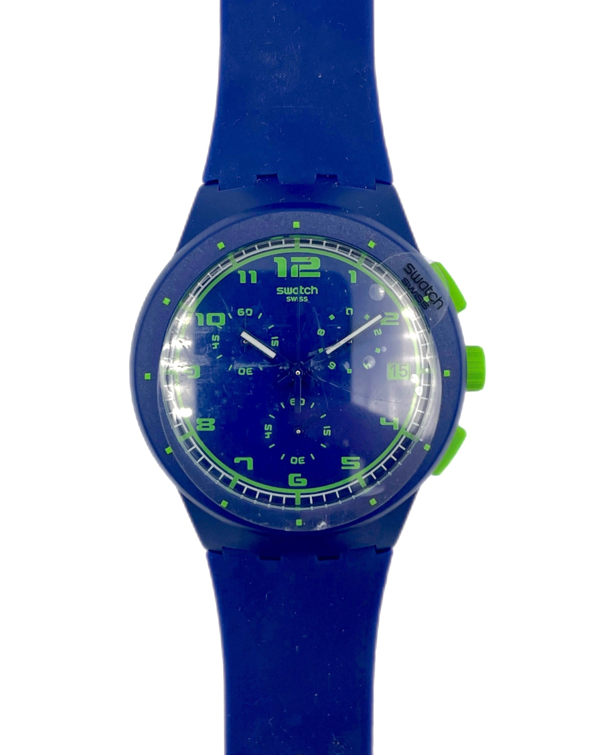 Blue Swatch watch with green accents on a white background