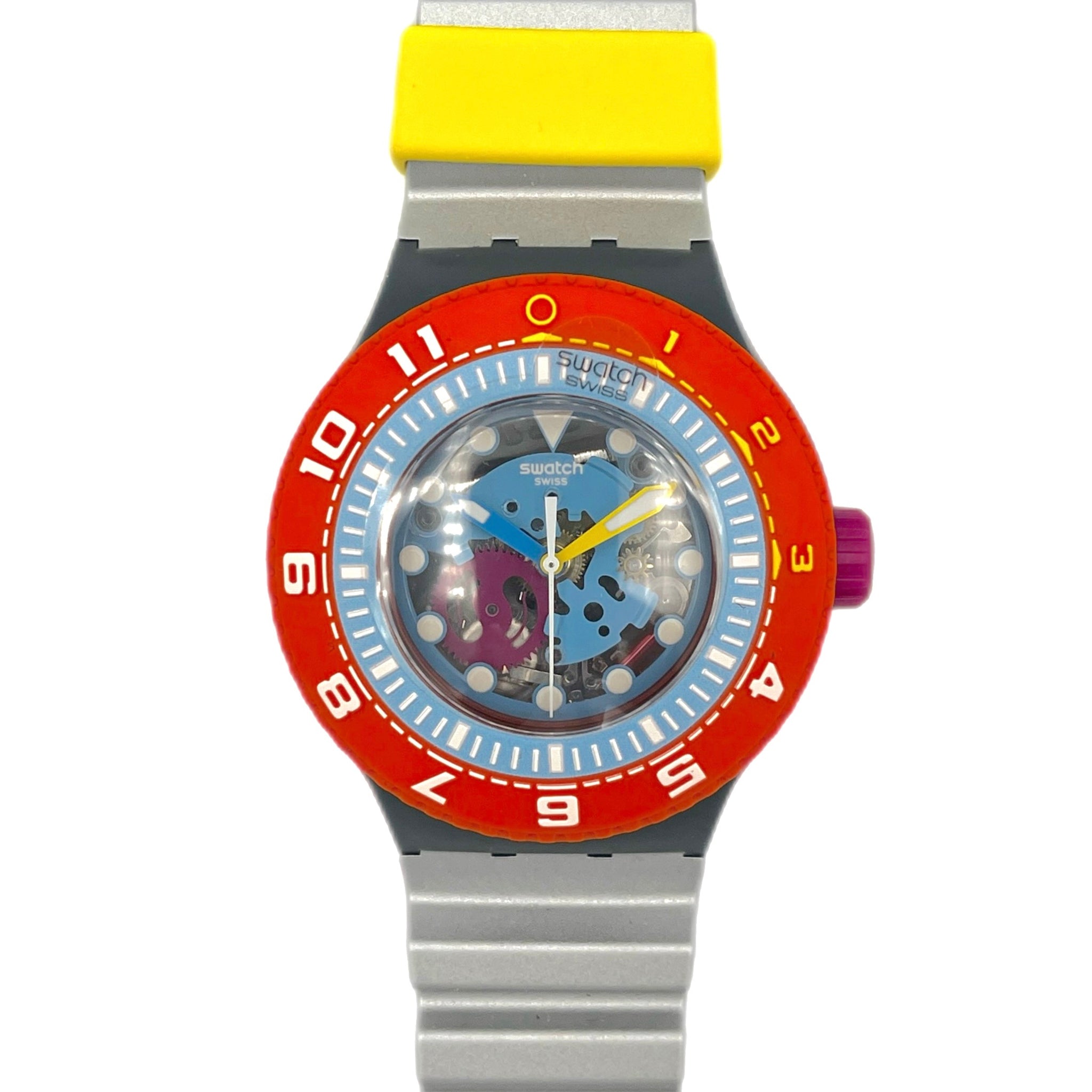 Colorful watch with a red bezel, yellow strap, and silver band on a white background
