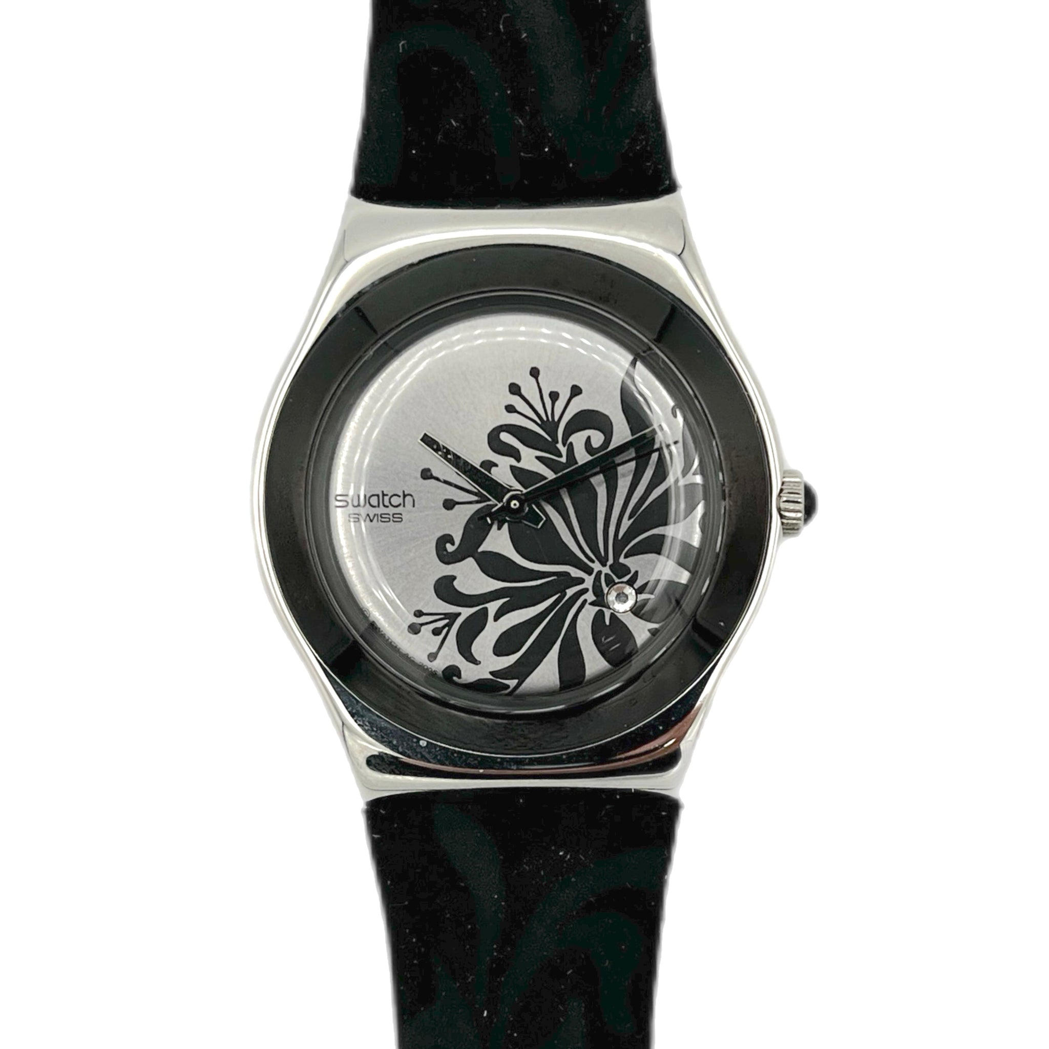 Swatch watch with black floral design on a white background