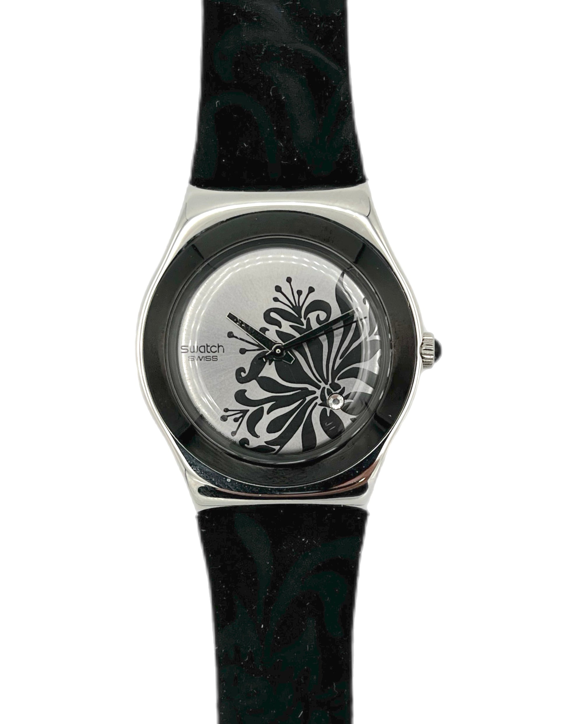 Swatch watch with black floral design on a white background