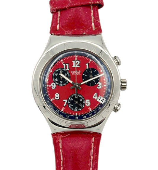 Watch with red strap and red face on a white background