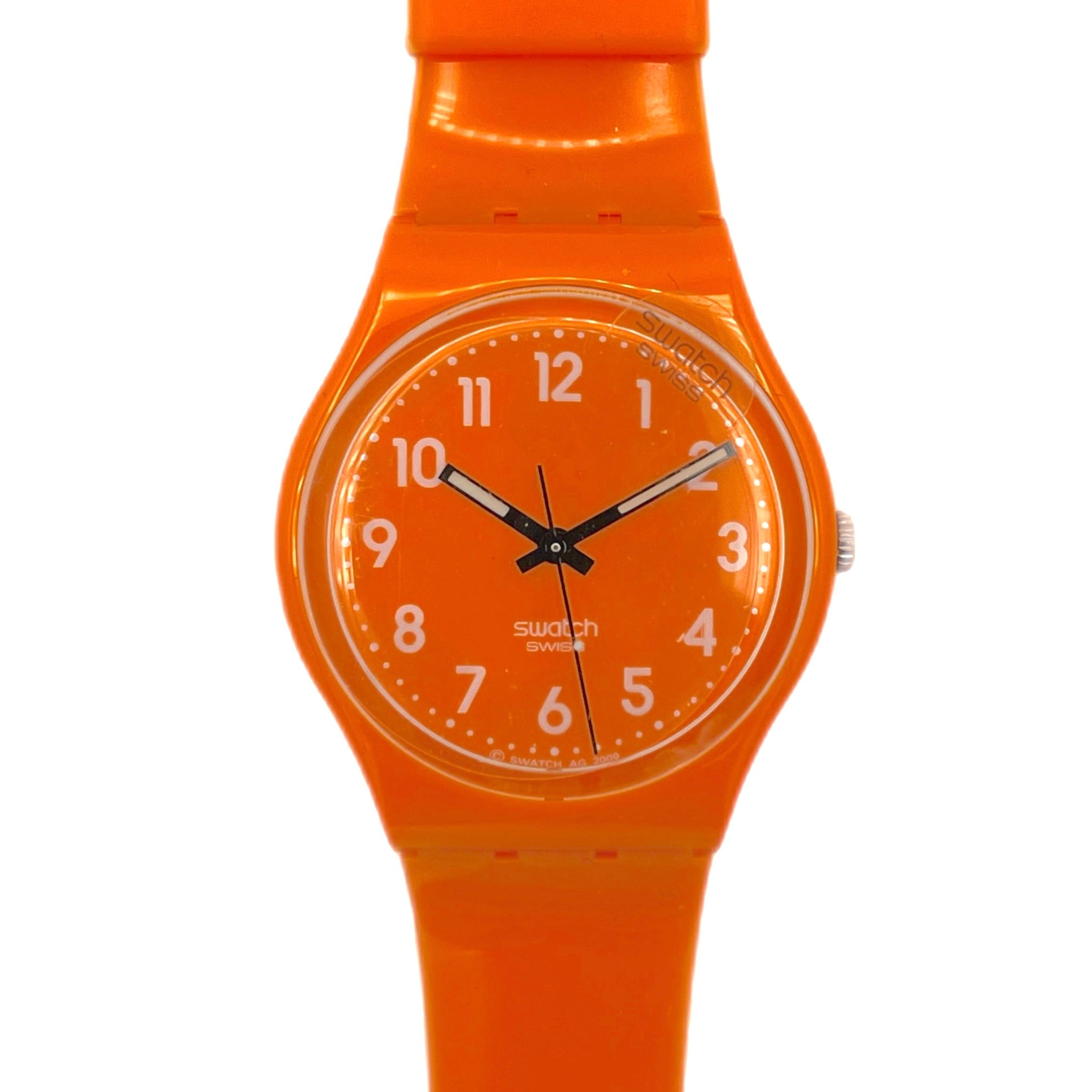 Orange Swatch watch on a white background