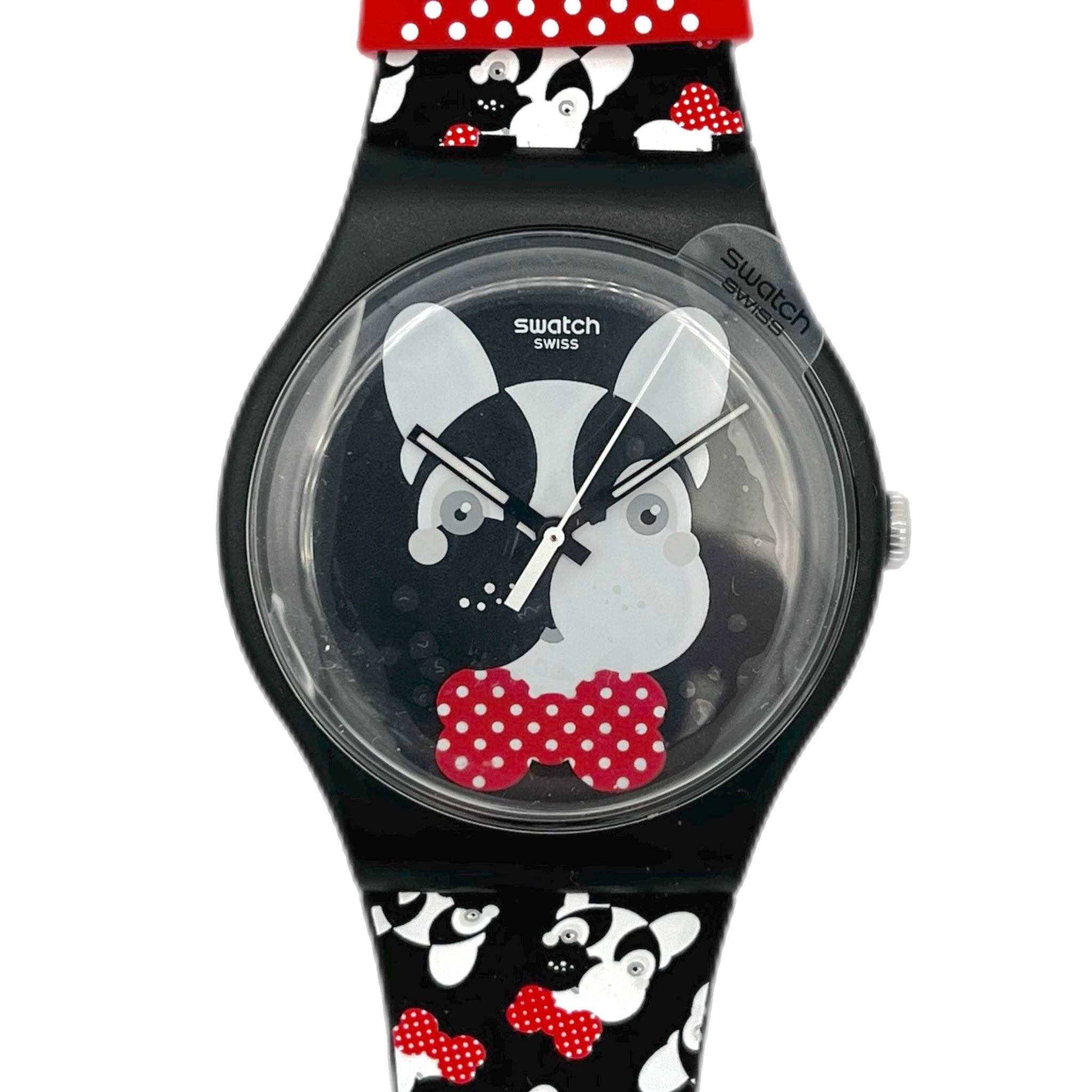 Swatch watch with a black strap featuring a dog design and red accents on a white background