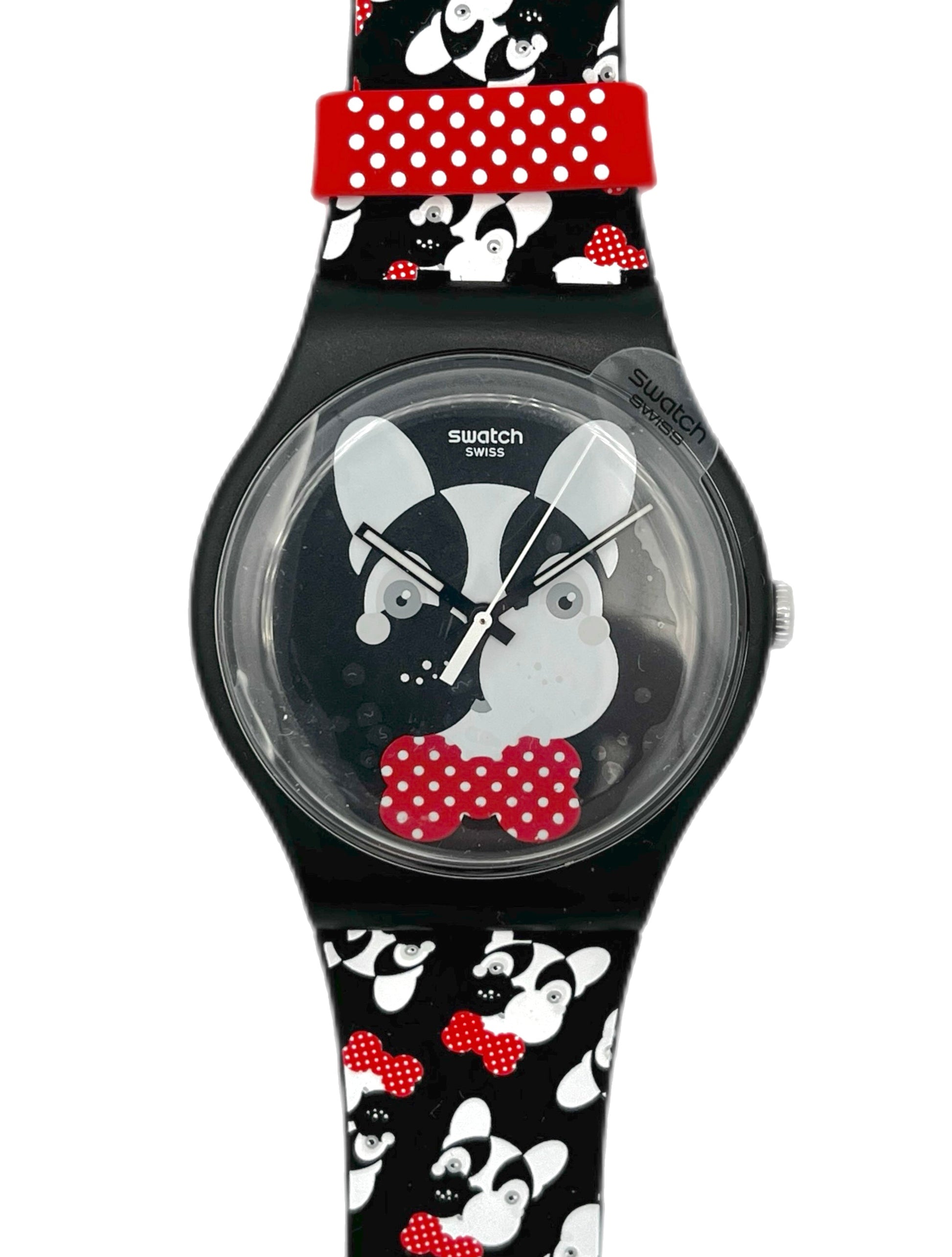 Swatch watch with a black strap featuring a dog design and red accents on a white background