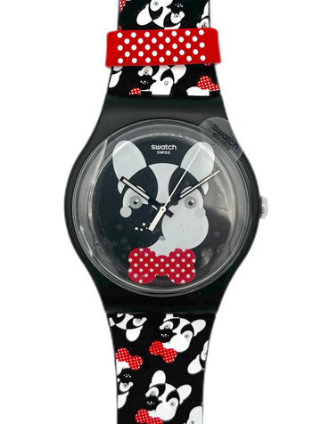 Swatch watch with a black strap featuring a dog design and red accents on a white background