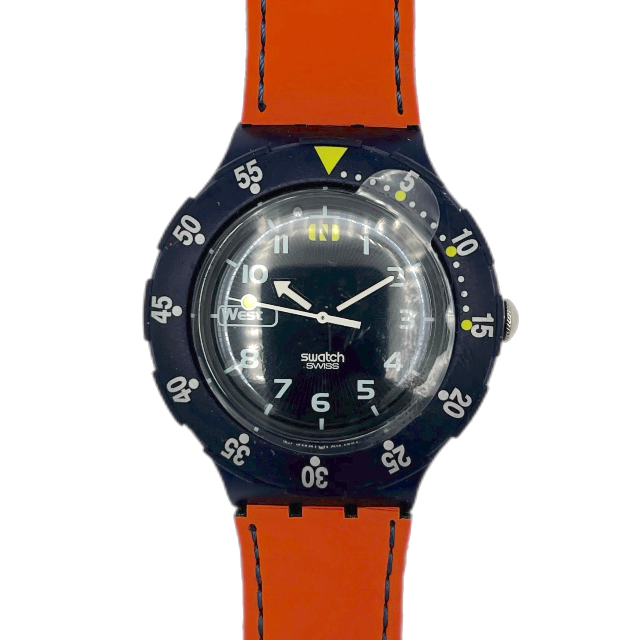 Swatch watch with orange strap and blue dial on a white background