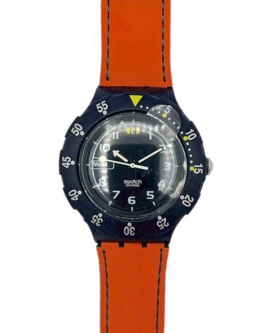 Swatch watch with orange strap and blue dial on a white background
