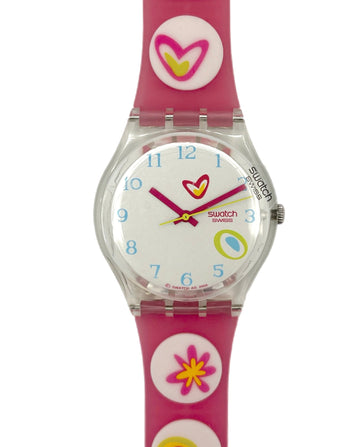 Swatch watch with colorful dial and pink strap on a white background