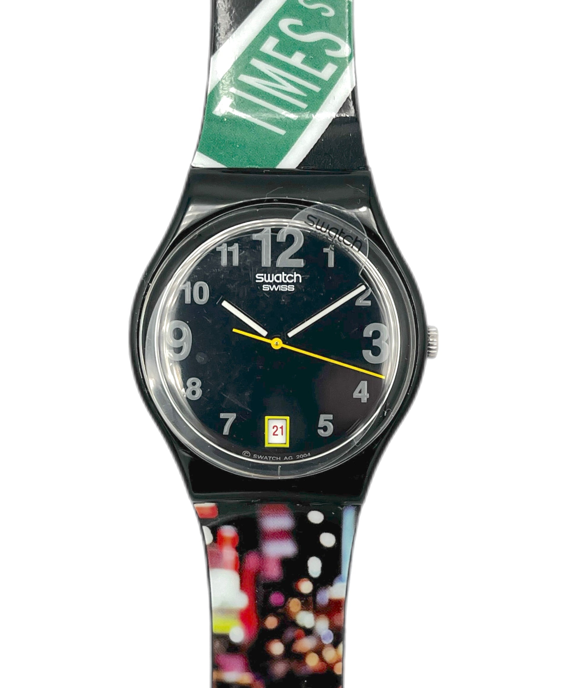 Swatch watch with a colorful strap on a white background