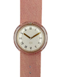 Wristwatch with pink strap and white face on a white background