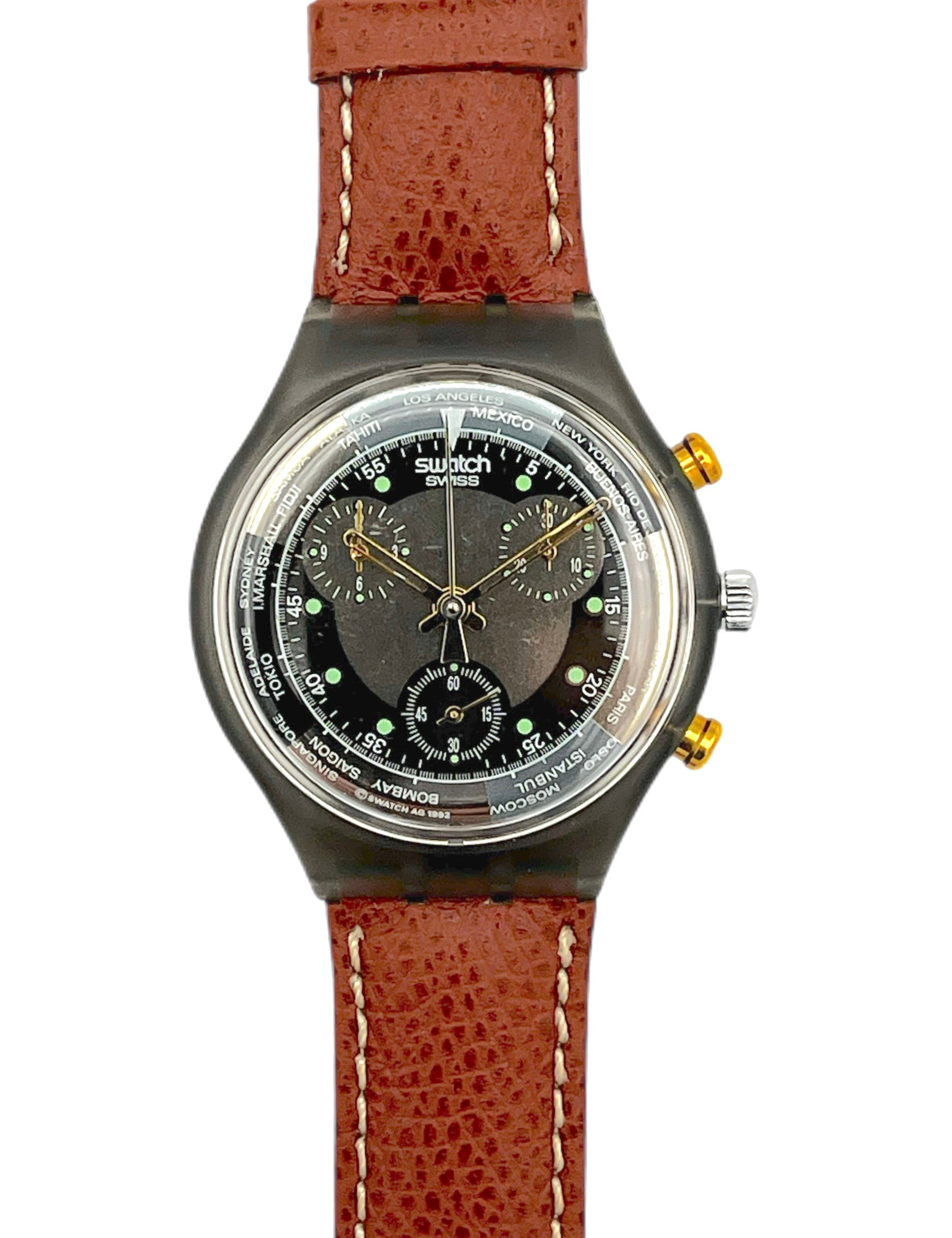 Swatch watch with brown leather strap on a white background