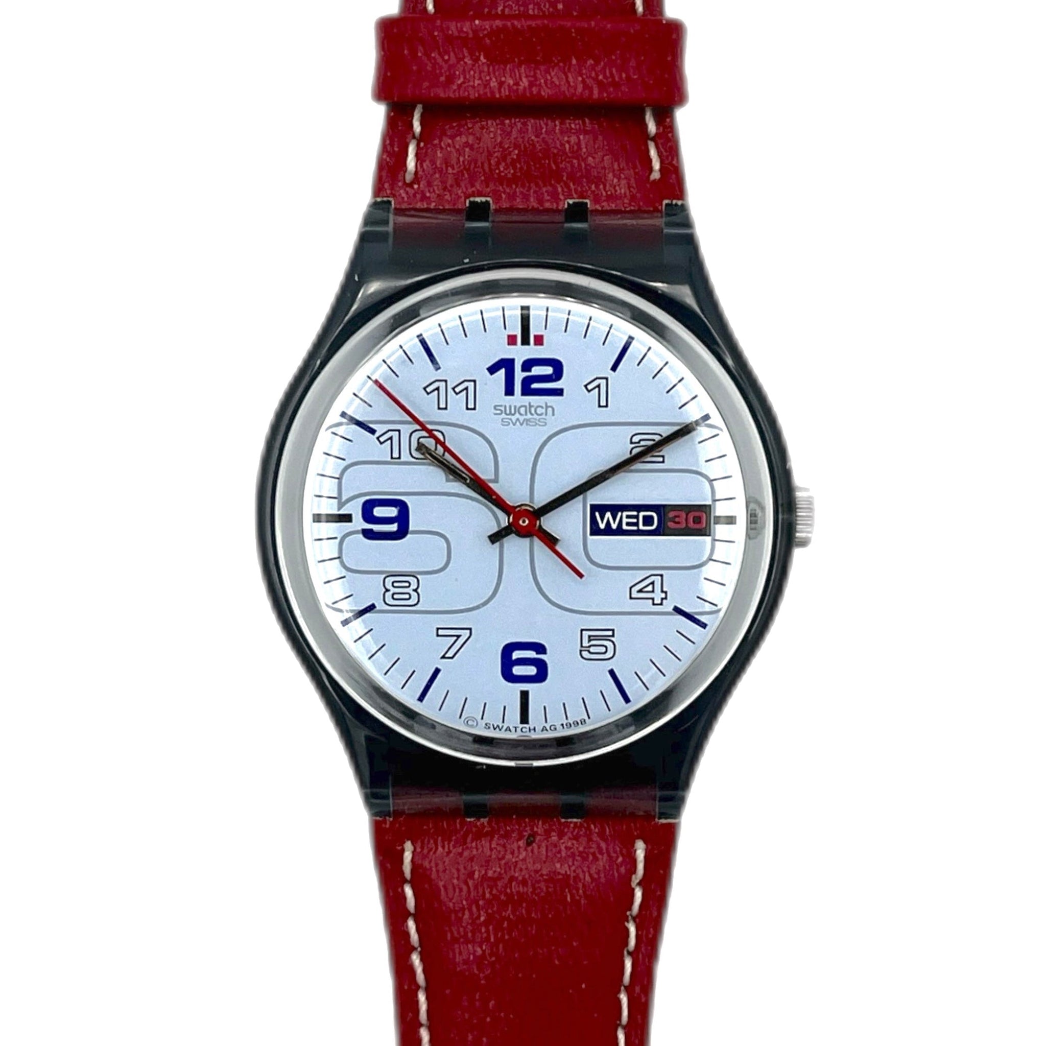 Watch with a red strap on a white background