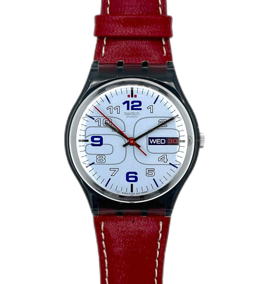 Watch with a red strap on a white background