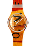 Wooden Swatch watch with black abstract design on a white background
