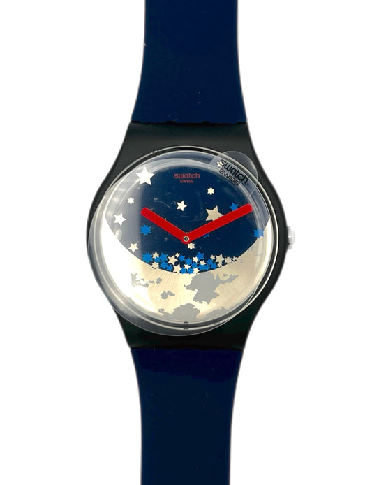 Wristwatch with a blue strap and a starry night design on the face, on a white background.