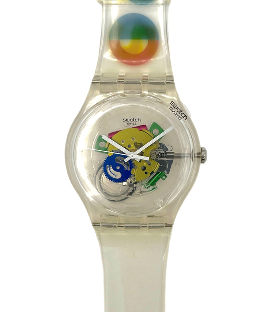 Clear Swatch watch with colorful face and Milano 2015 design on a white background