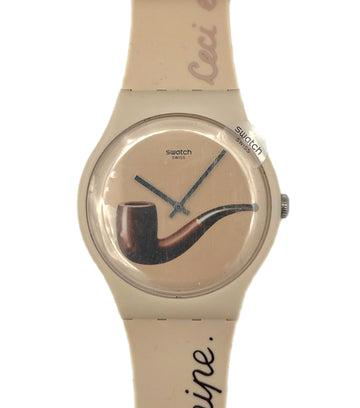 Beige Swatch watch with a pipe design by Magritte SO29Z124