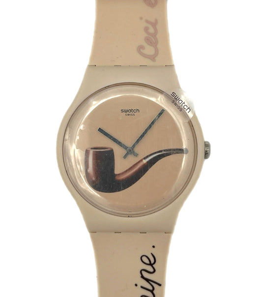 Beige Swatch watch with a pipe design by Magritte SO29Z124
