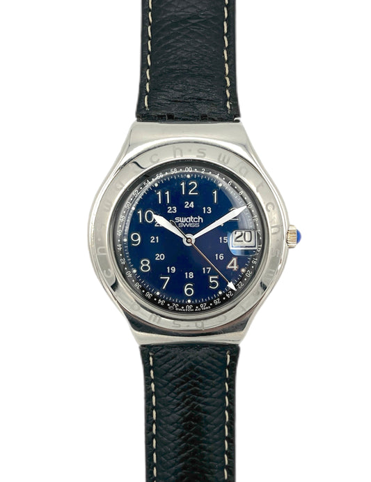 Swatch watch with blue dial and black strap on a white background