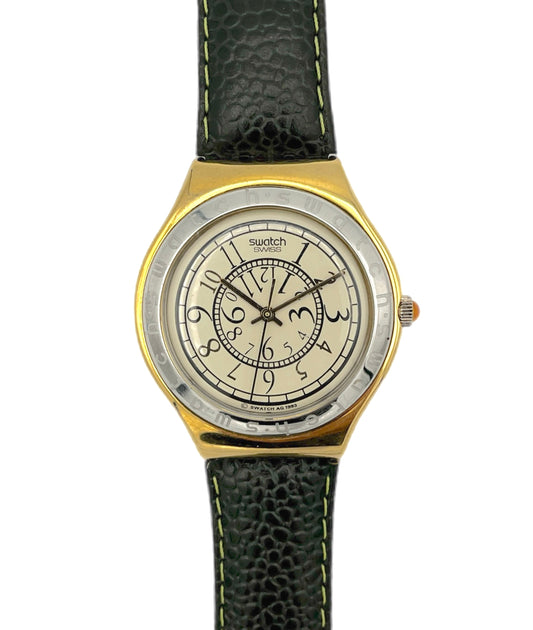 Swatch watch with dark green  leather strap and gold case from the Iroby Big series
