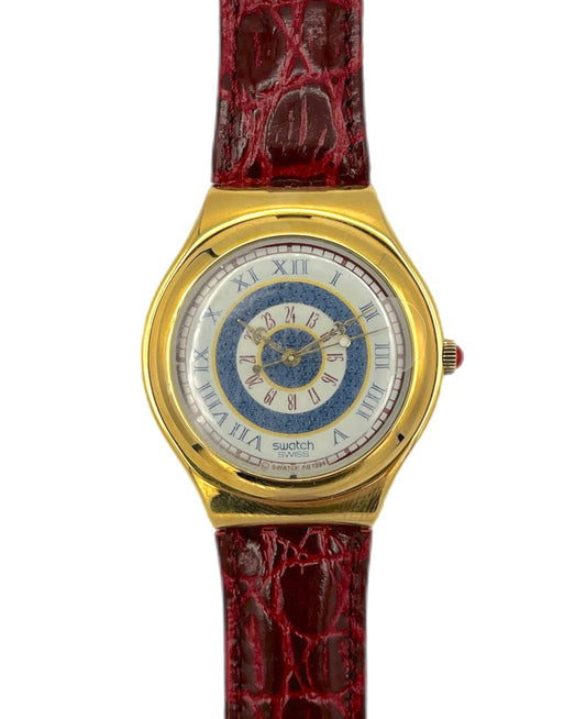 Gold watch with a red strap on a white background