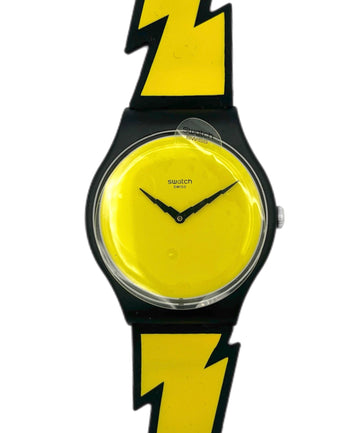 Wristwatch with yellow face and black lightning bolt design on a white background