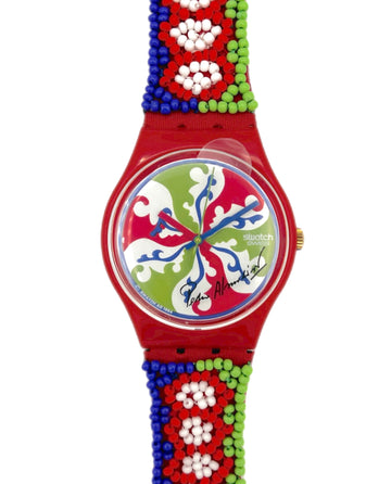 Colorful watch with a red strap featuring bead patterns on a white background