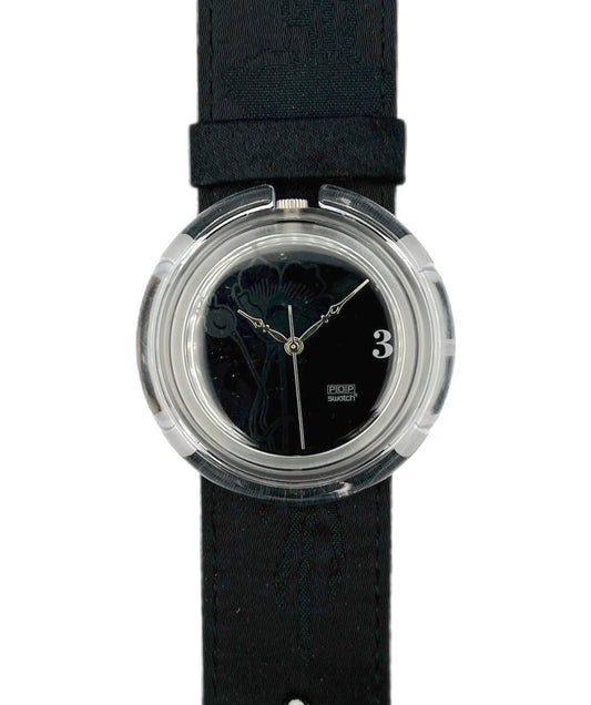 Black wristwatch with a clear case on a white background