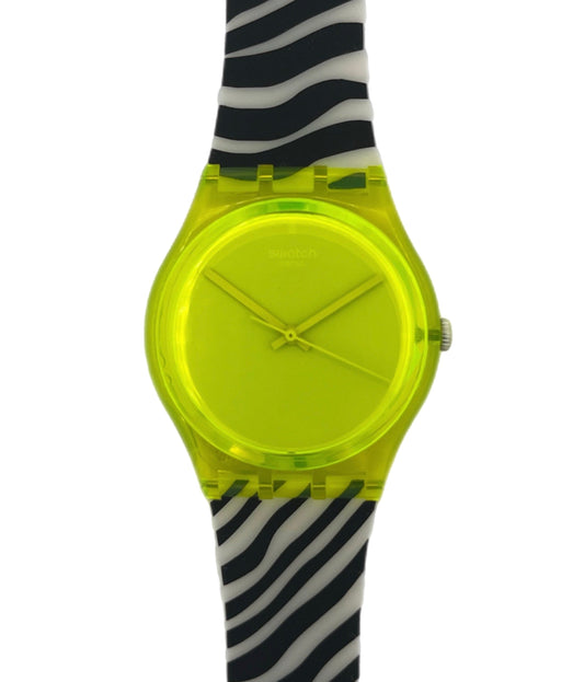 Swatch with a neon yellow face and black and white zebra pattern strap on a white background