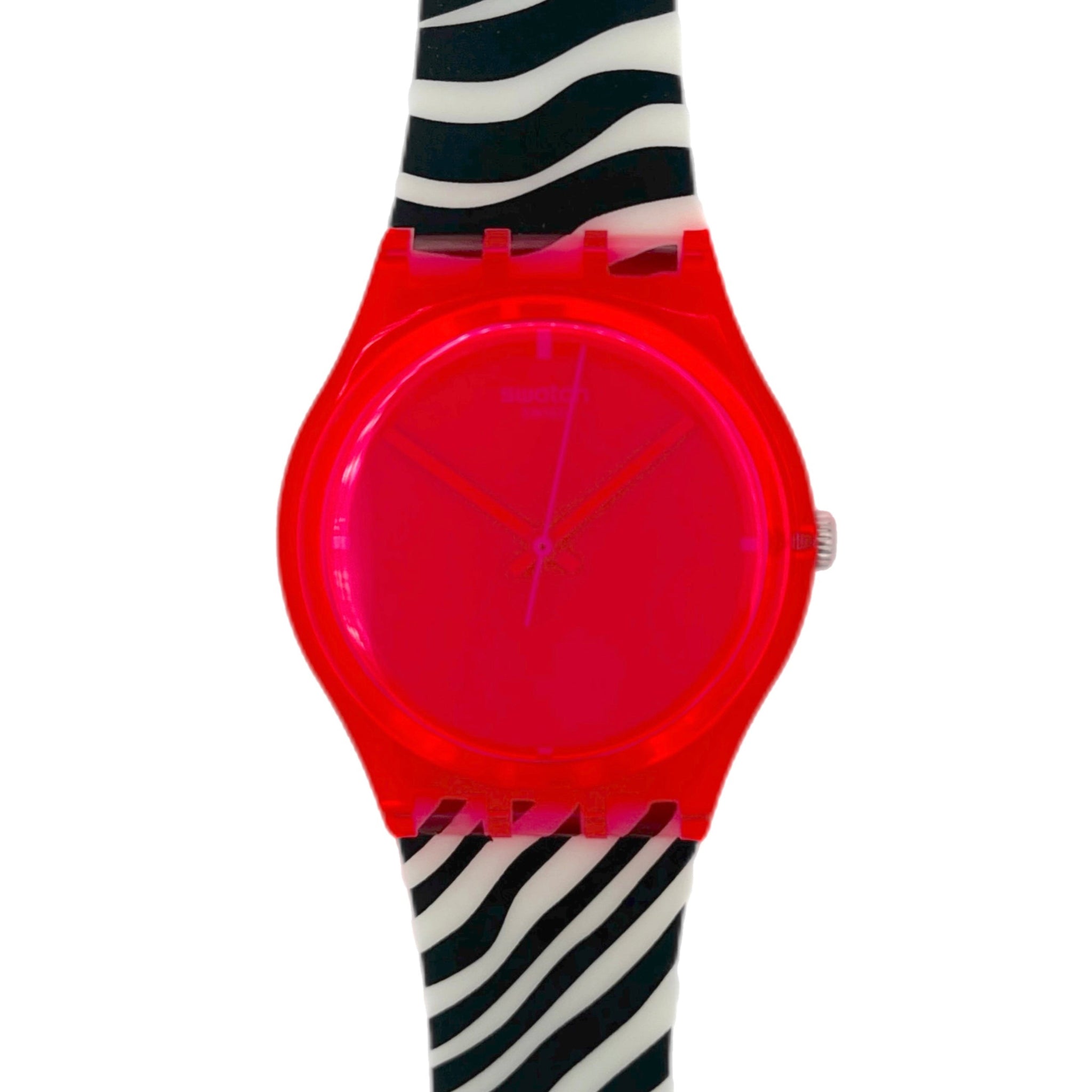 Pink neon Swatch with a zebra-patterned strap on a white background