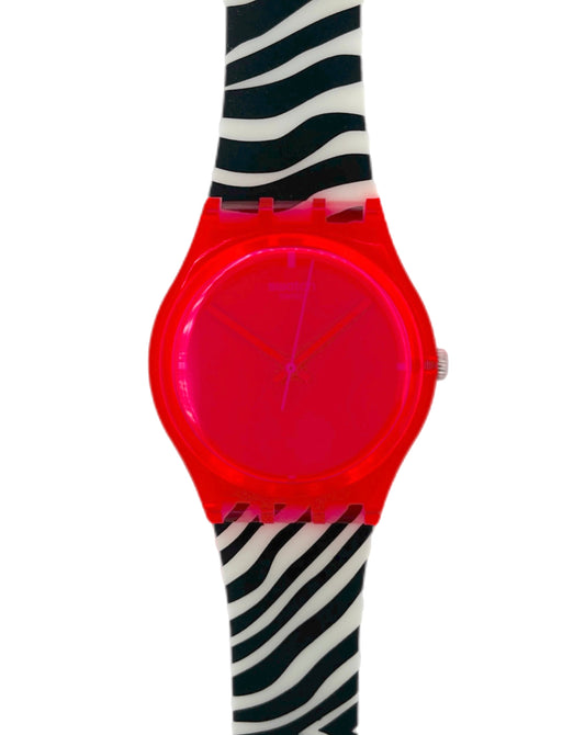 Pink neon Swatch with a zebra-patterned strap on a white background