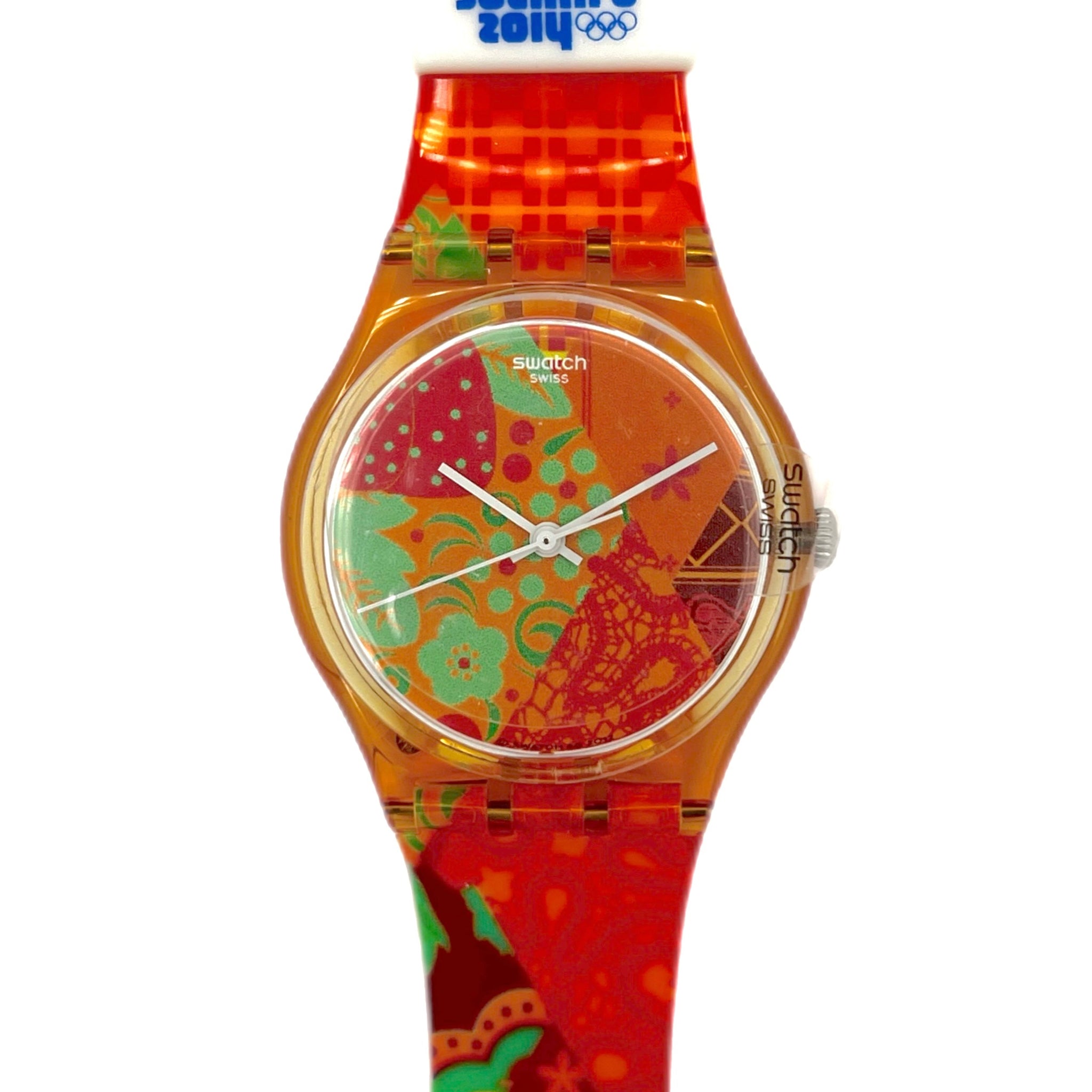 Colorful Swatch watch with a patterned face and red band on a white background