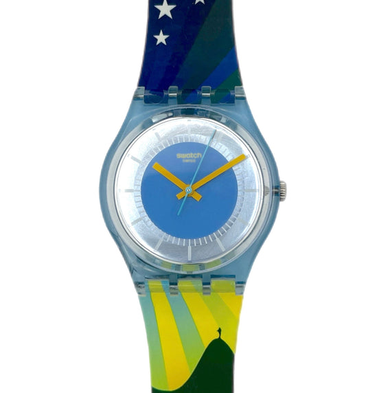 Watch with a colorful strap featuring a mountain and star design on a white background