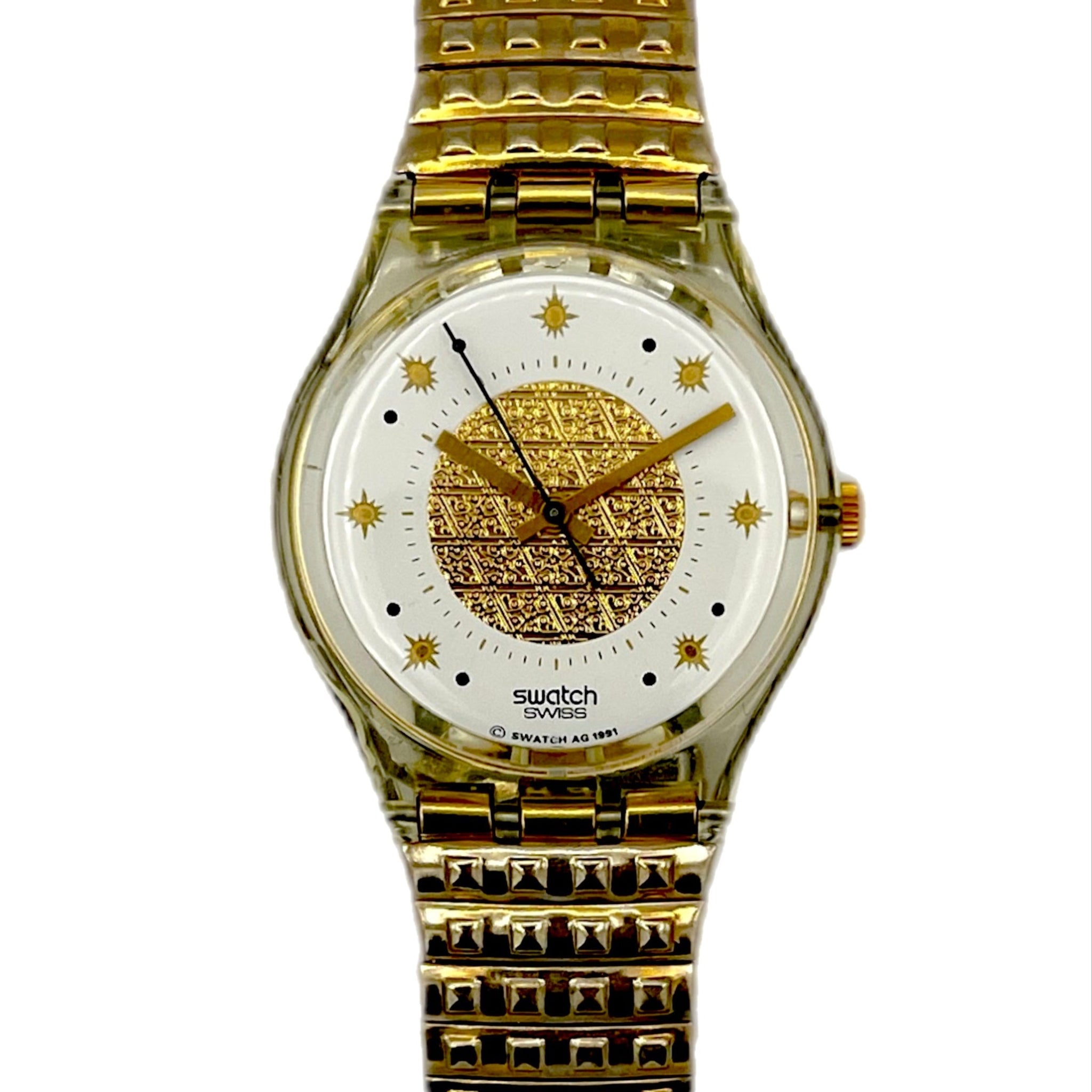 Gold Swatch watch on a white background