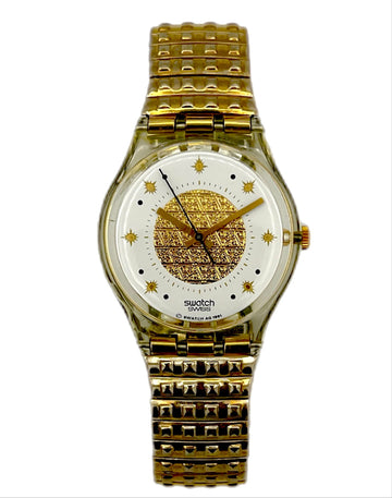 Gold Swatch watch on a white background