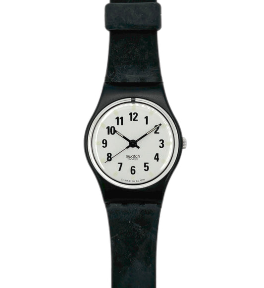 Black Swatch watch with a white face on a white background