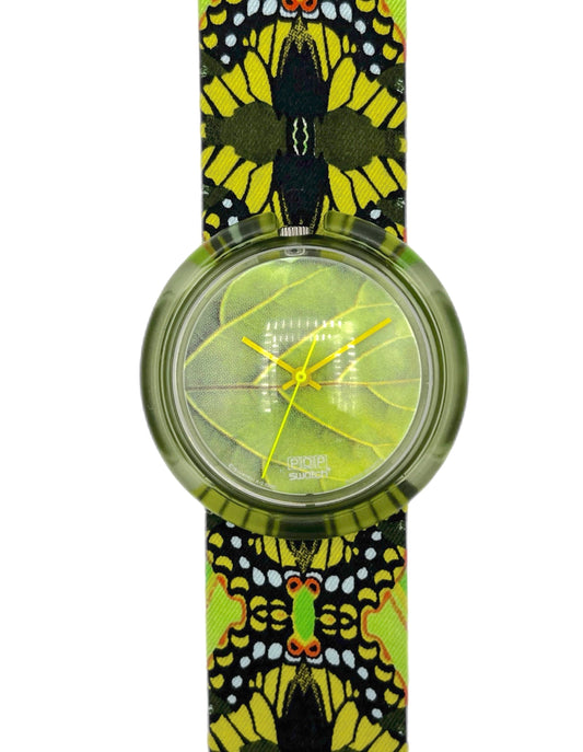 Watch with a butterfly patterned strap on a white background