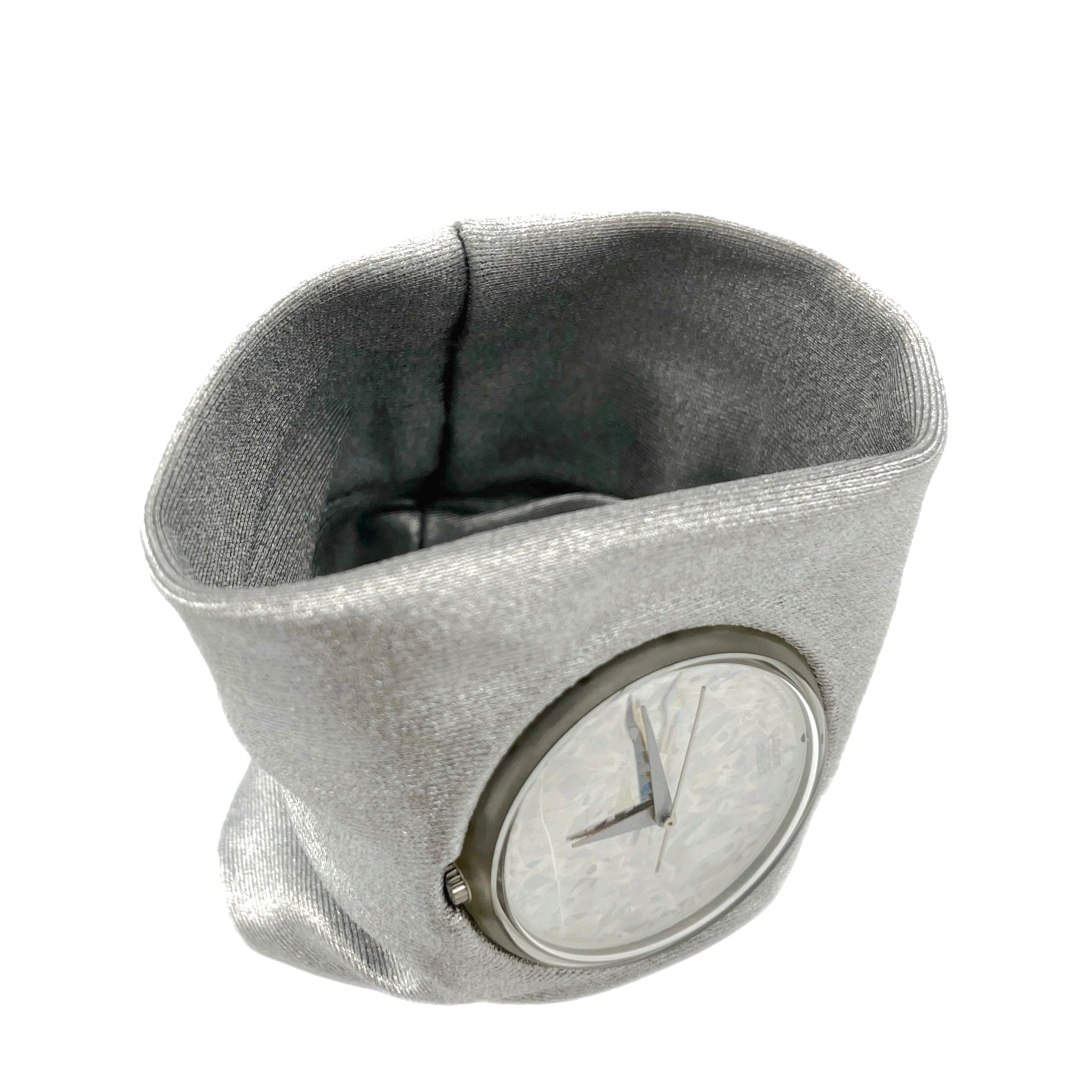 Gray fabric wristband with a clock face on a white background