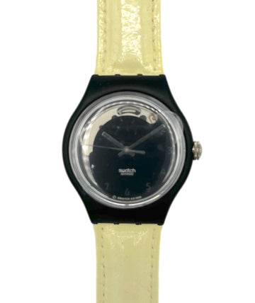 Watch with black case and beige strap on a white background