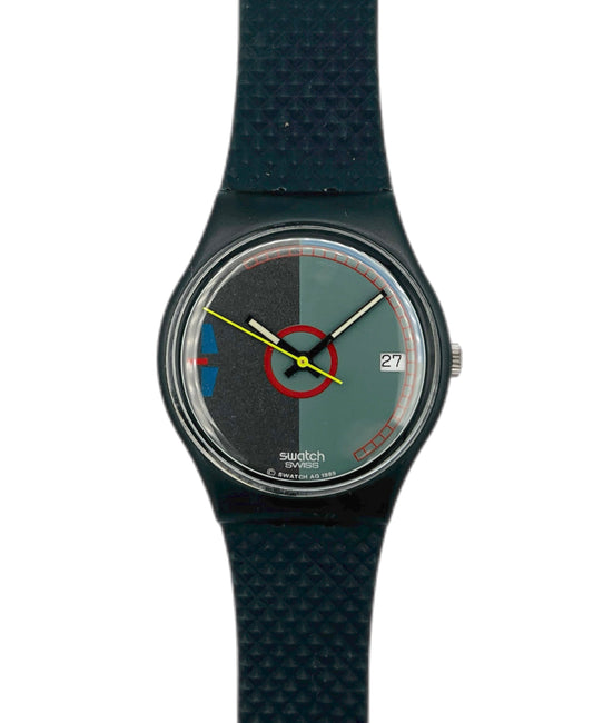 Swatch watch with black strap and multicolored face on a white background
