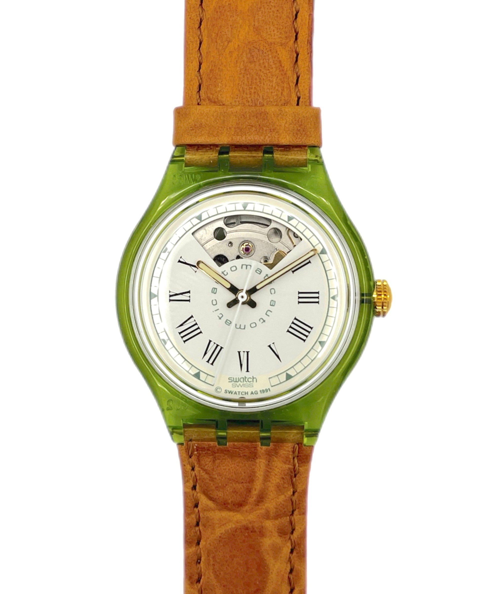 Swatch Automatic Watch with green case and brown leather strap on a white background